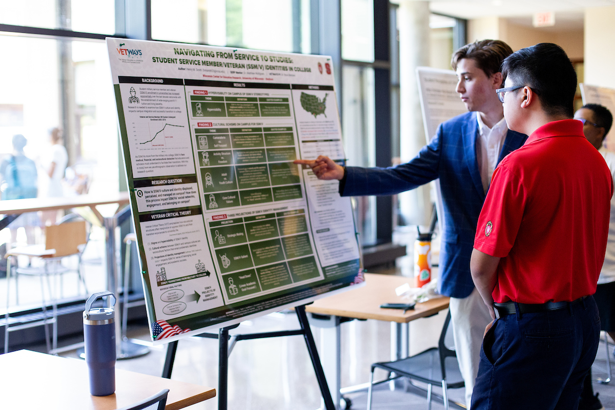 poster fair in the lobby of the Education building