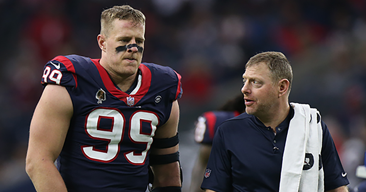 Geoff Kaplan walking alongside Houston Texans football player