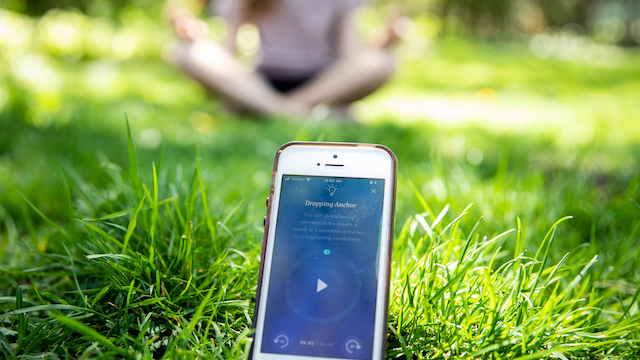 Phone with healthy minds app opened