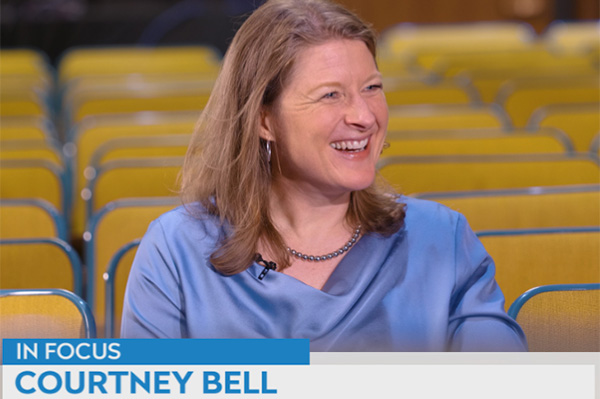 Courtney Bell being interviewed on the news
