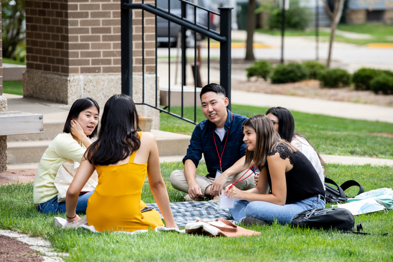 students on the grass
