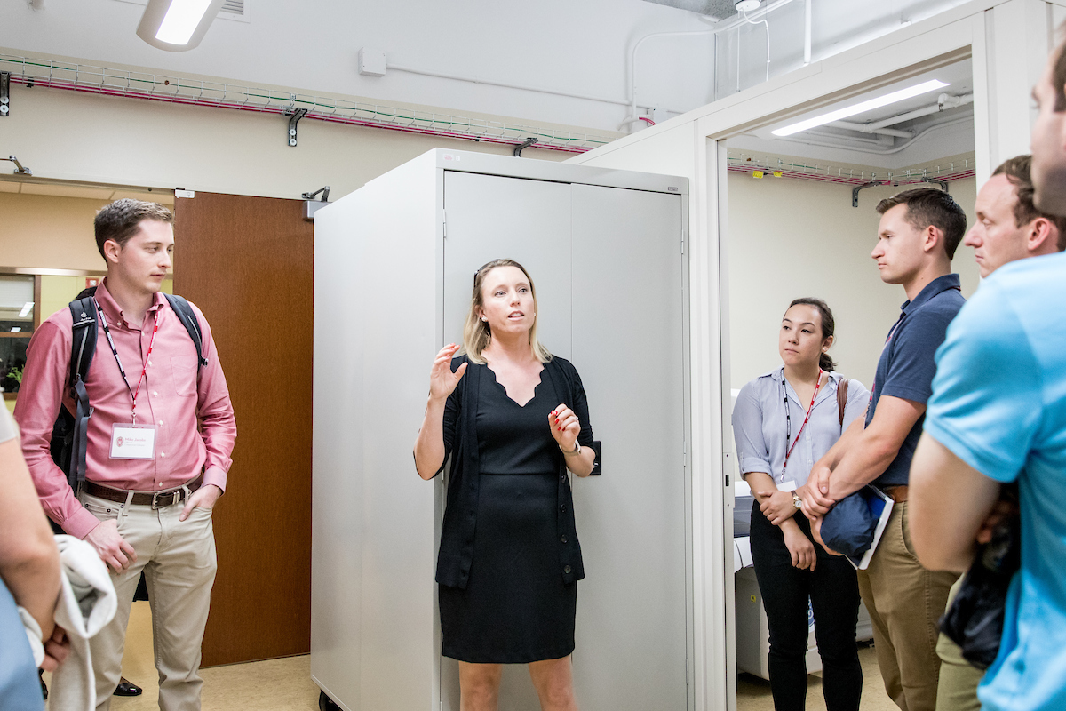 Lisa Cadmus-Bertram explaining her research to a group
