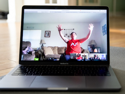 Autumn Neugent leads a virtual chair yoga class in April while meeting in person on campus was not possible due to the COVID-19 pandemic