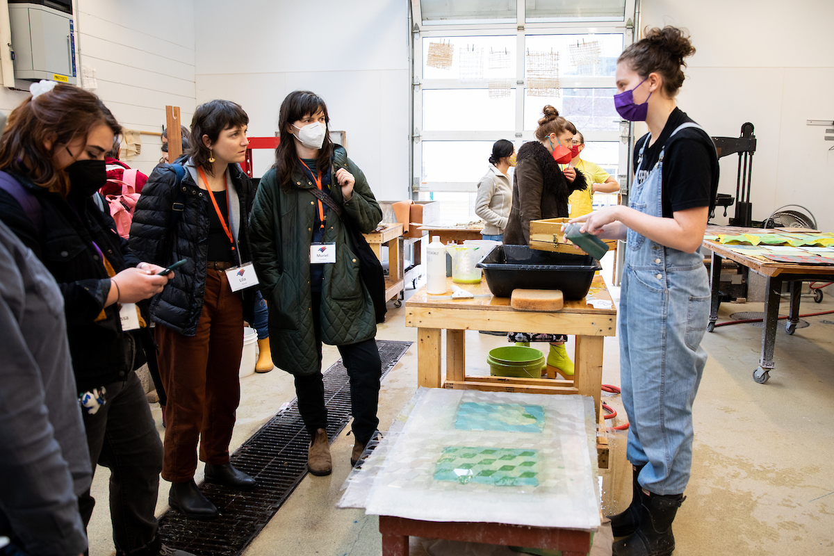 UW–Madison student demonstrates papermaking