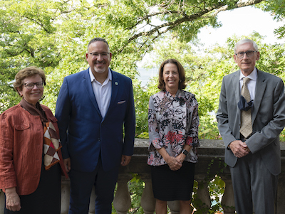 Chancellor Blank, Secretary Cardona, Dean Hess, and Gov. Evers