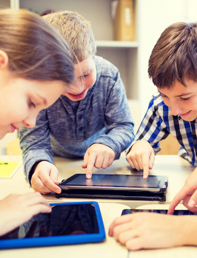 Children using iPads