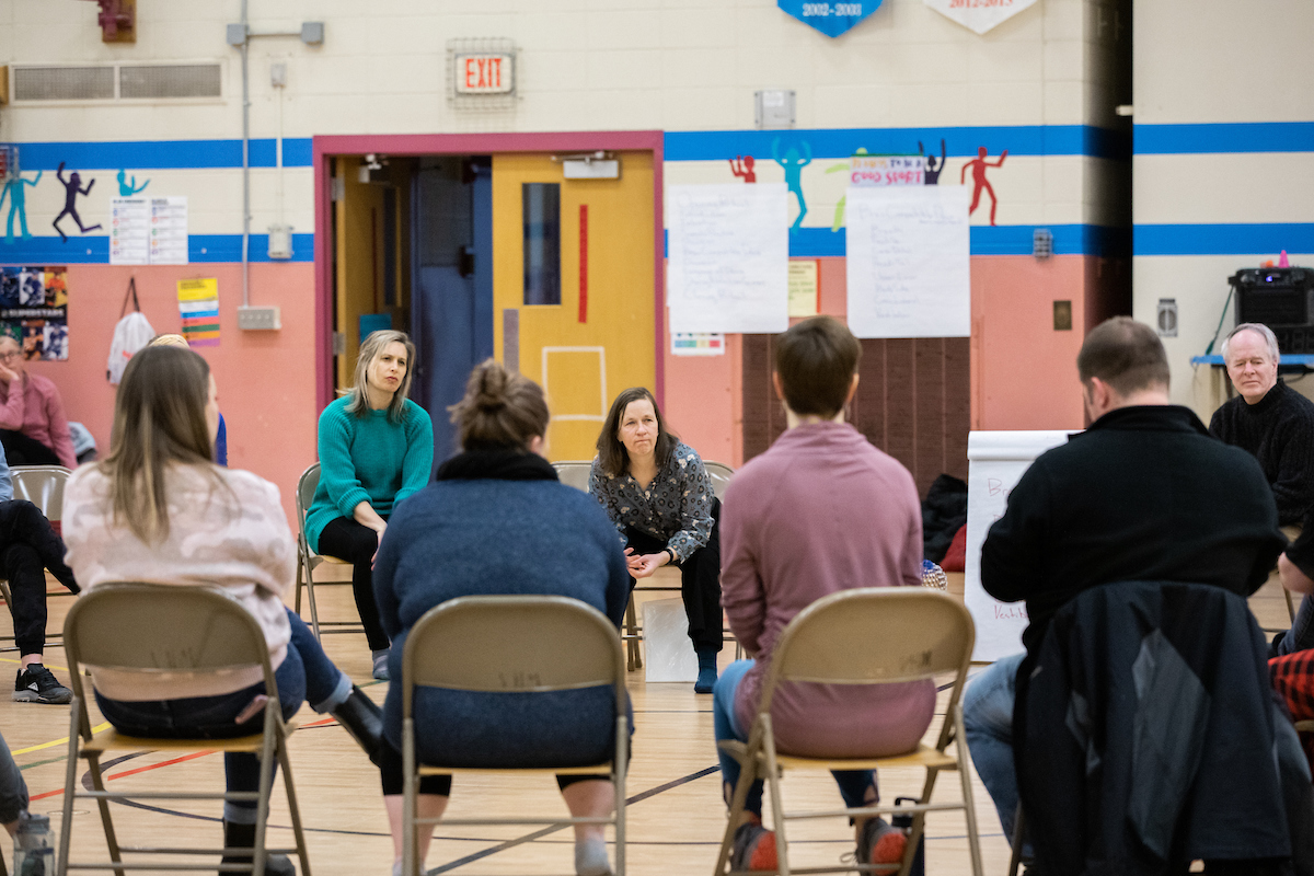 Parkins (center) leads a workshop with Madison educators 