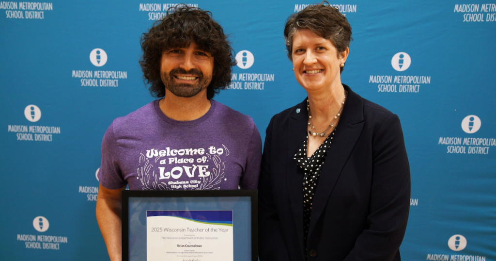 Counselman (left) receives his award from State Superintendent Jill Underly.