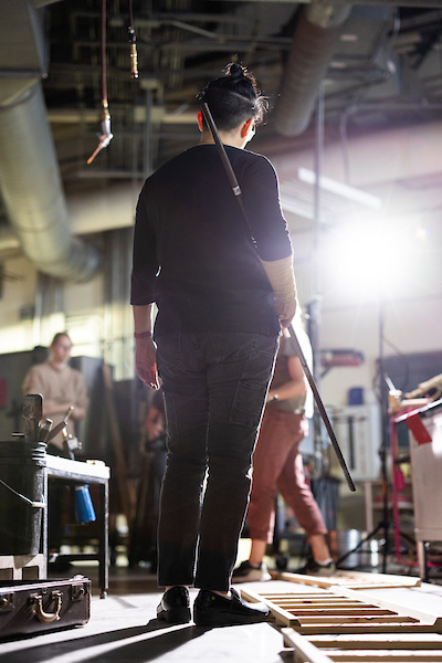 Helen Lee watches students working in the Glass Lab