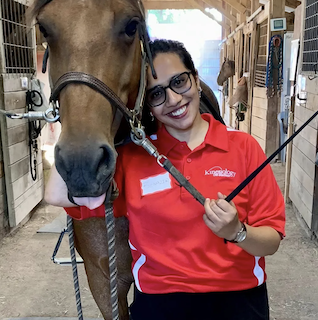 Benazir Meera with a horse