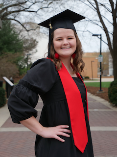 Abigail Laumer wearing a graduation cap