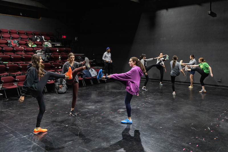 The cast of "The Wolves" warming up
