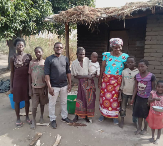 Circle of Care staff member, grandmother, and grandchildren