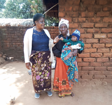 Circle of Care staff member, grandmother and grandchild