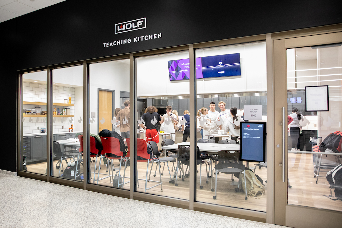 looking into a test kitchen where students are working