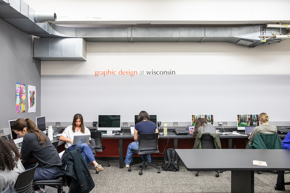 students working in a graphic design class