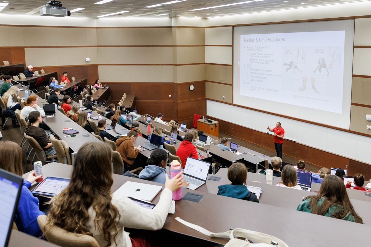 a teacher teaching a college course