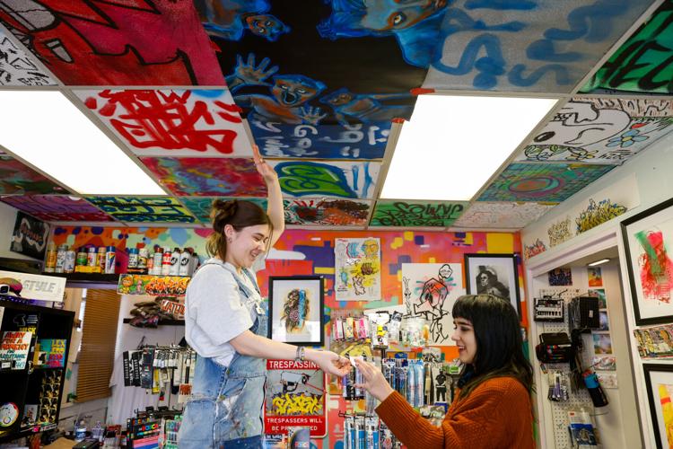 Hunter and Albelo set up their exhibition