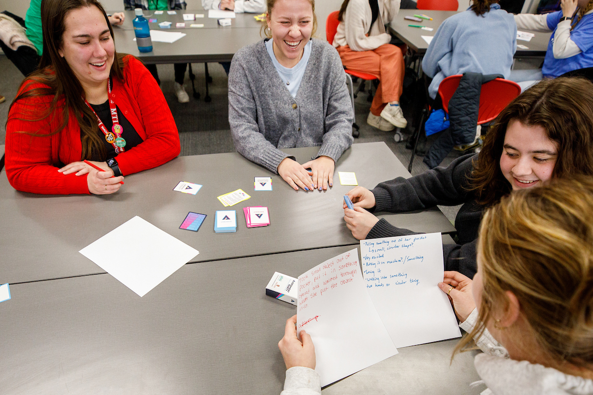 Kate Meyer (left) works with a group 