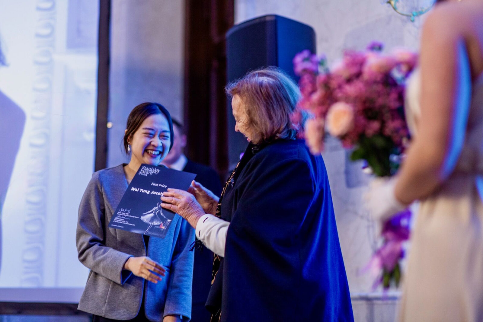 Wai Tung Jocelyn Chan is presented with the award