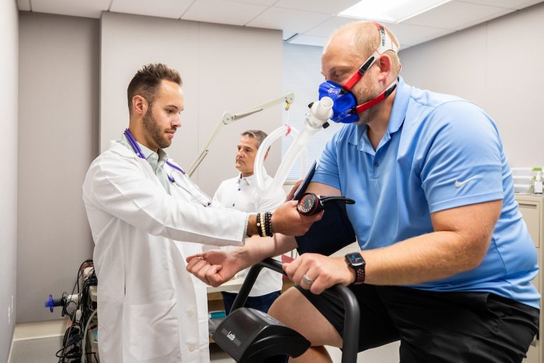 Boruch and Ninneman demonstrate how vital signs are measured