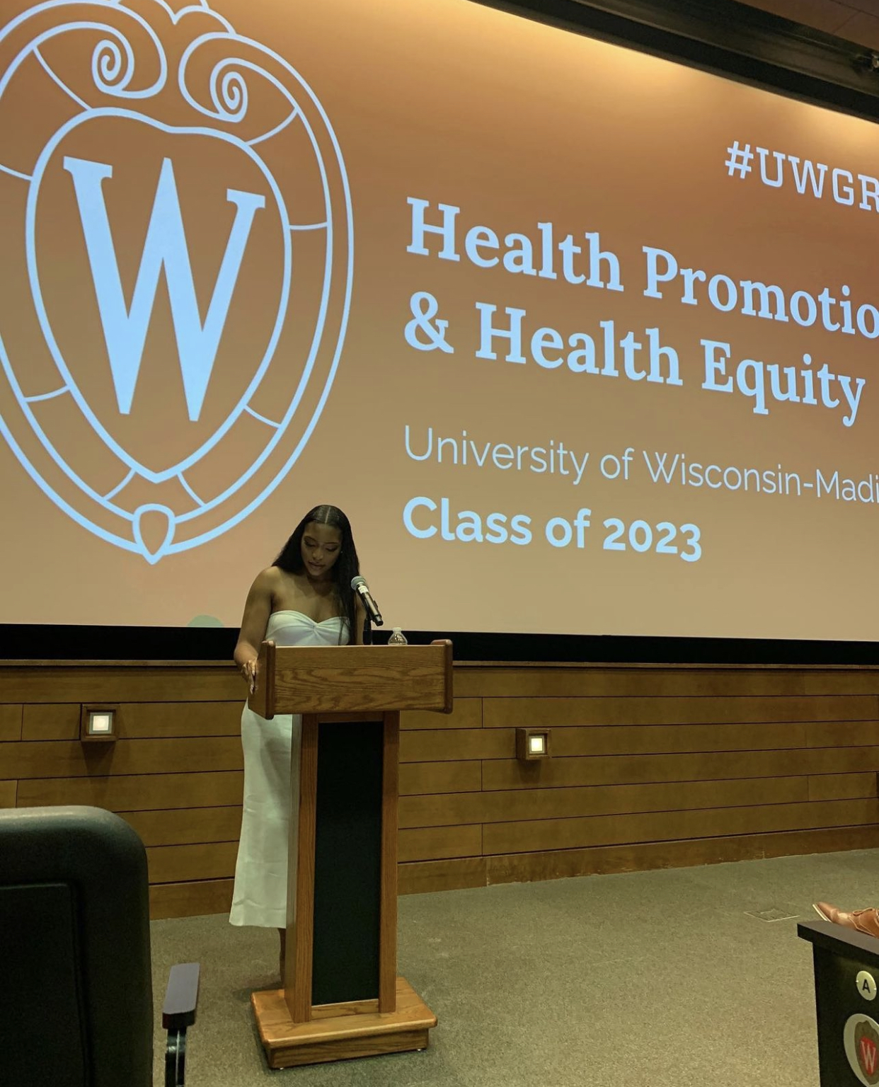 Lauren Etti speaks at a podium
