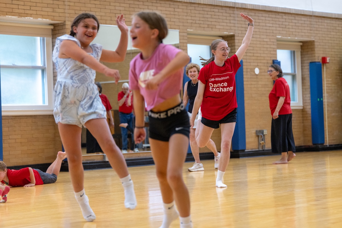 Sabrina Bonine works with students