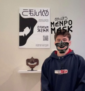 Escobar with his artwork