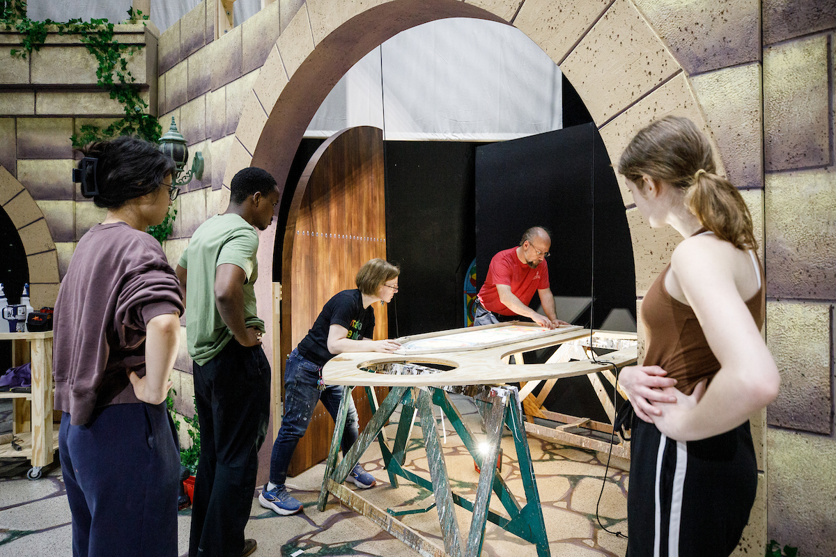 students working on set design for a play