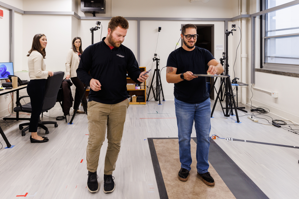 two students participating in a gait walking study