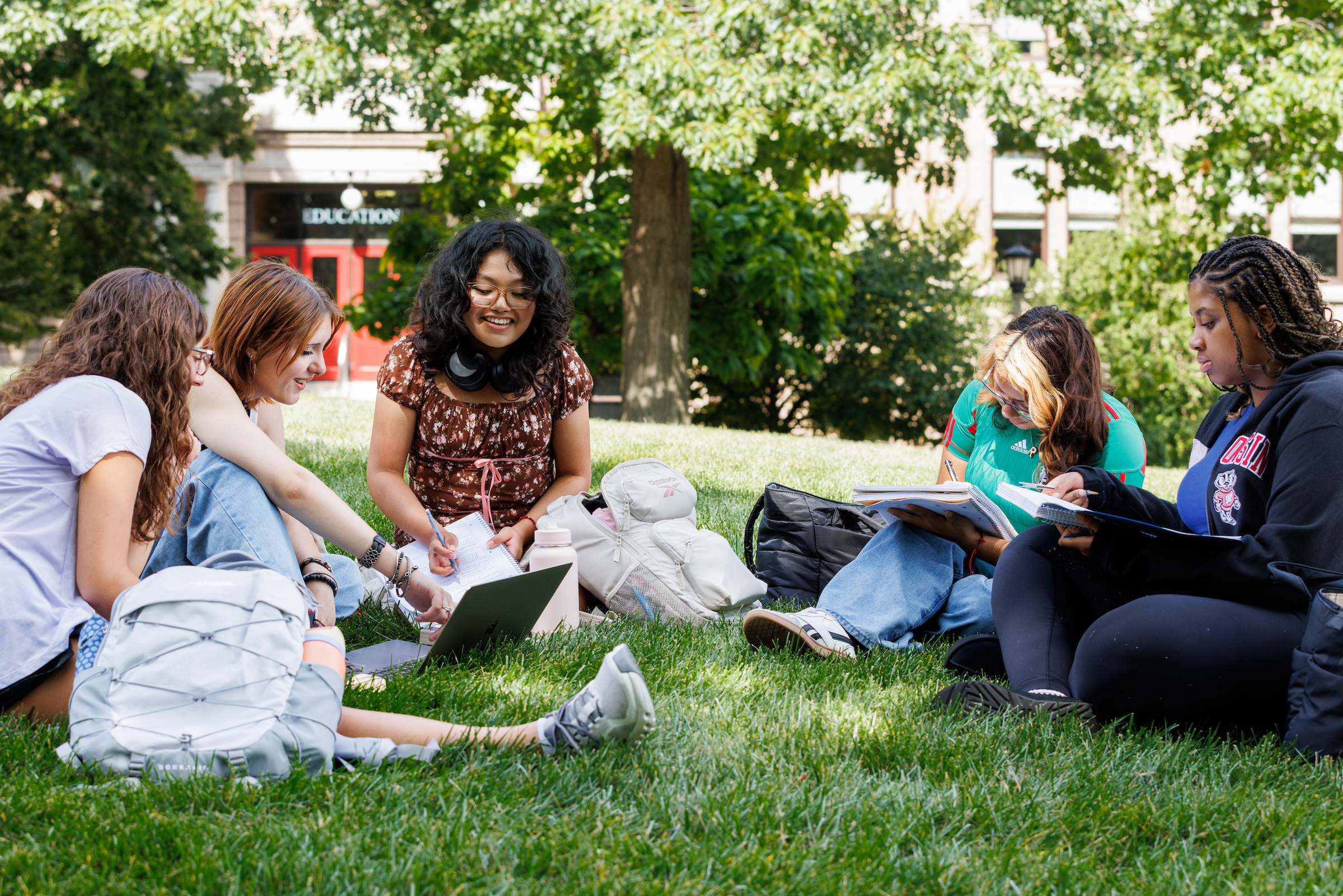 Students outside studying.