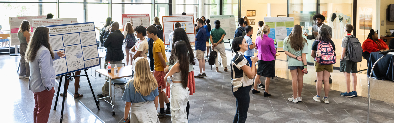 people at a poster fair