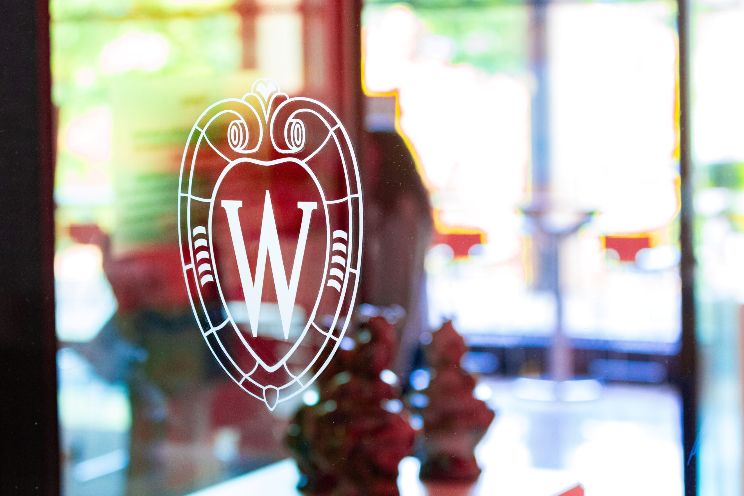 photo of the UW-Madison logo on glass