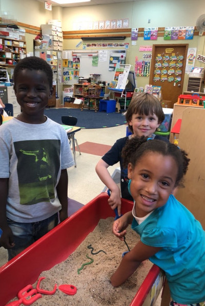4K students learn how to share, problem-solve and use fine motor skills while playing in Lapham Elementary School’s Sand Table.