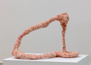 Figueroa-Daley’s piece, titled “EPIDERMIS//HYPODERMIS,” combines glass with pink fiberglass insulation to create a thought-provoking visual exploration of skin and tissue.