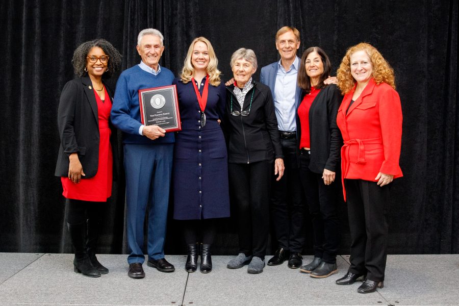 Dean Marcelle Haddix, Charles Pulvino, Mindi Thompson, Carol Pulvino, Todd Pulvino, Katie Pulvino and Chancellor Jennifer Mnookin pose for a group photo.