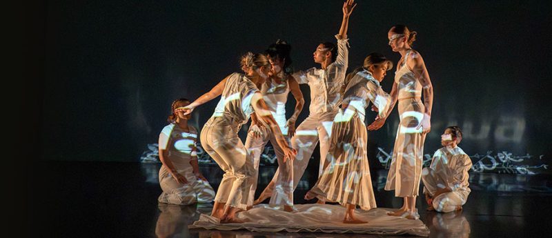 Students performing a dance number