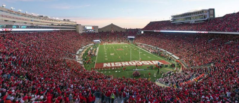 Camp Randall Stadium full of fans watching football