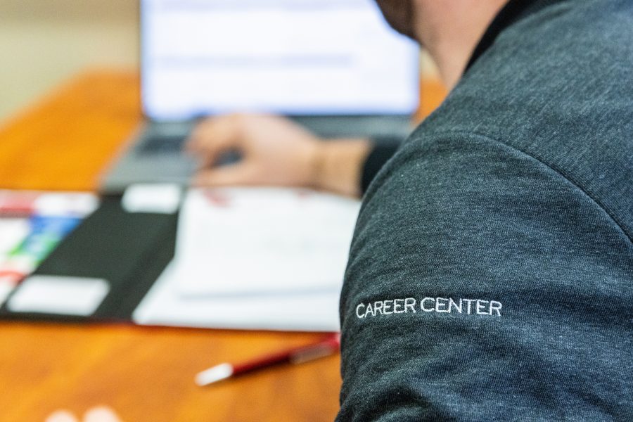 close up of career center wording on a persons shirt