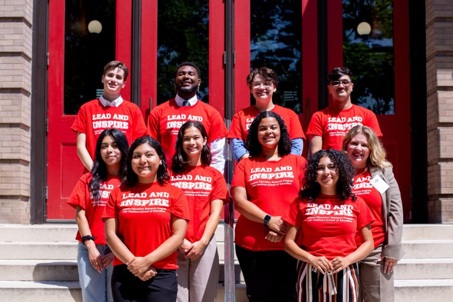 group photo of students on the steps of a building
