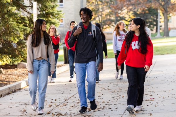 Students walking and talking outside